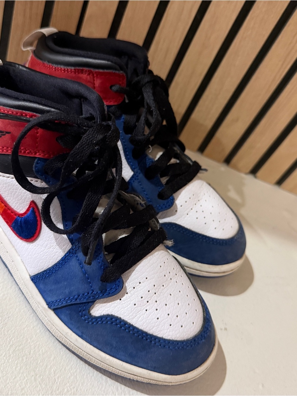 Bundle of 2 Kids High-Top Nike Jordans size 1Y  red, white, and blue & orange